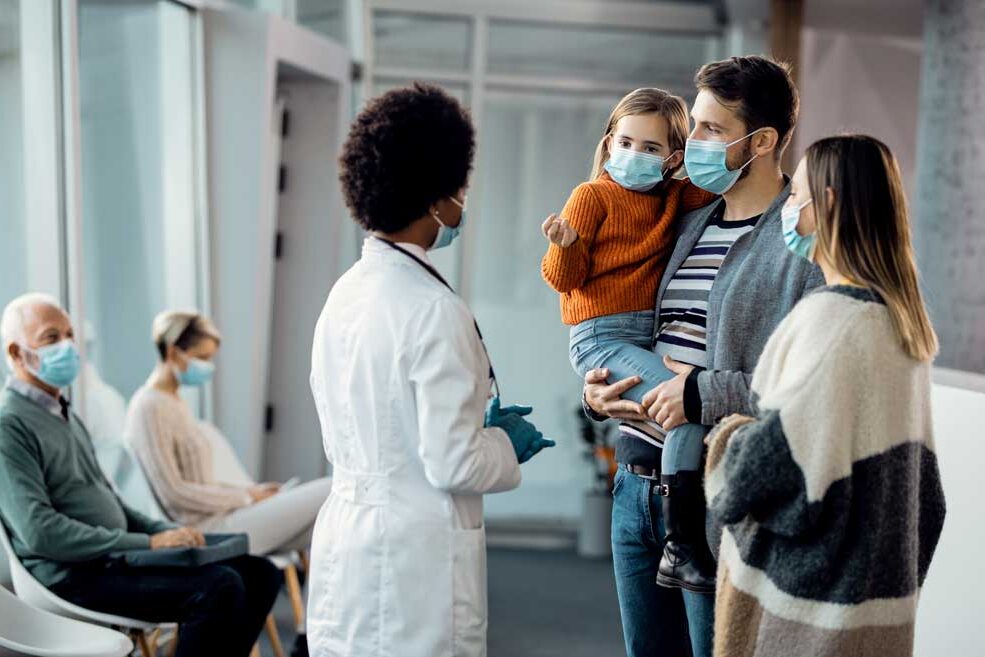 family of patients in waiting room during covid seeking care