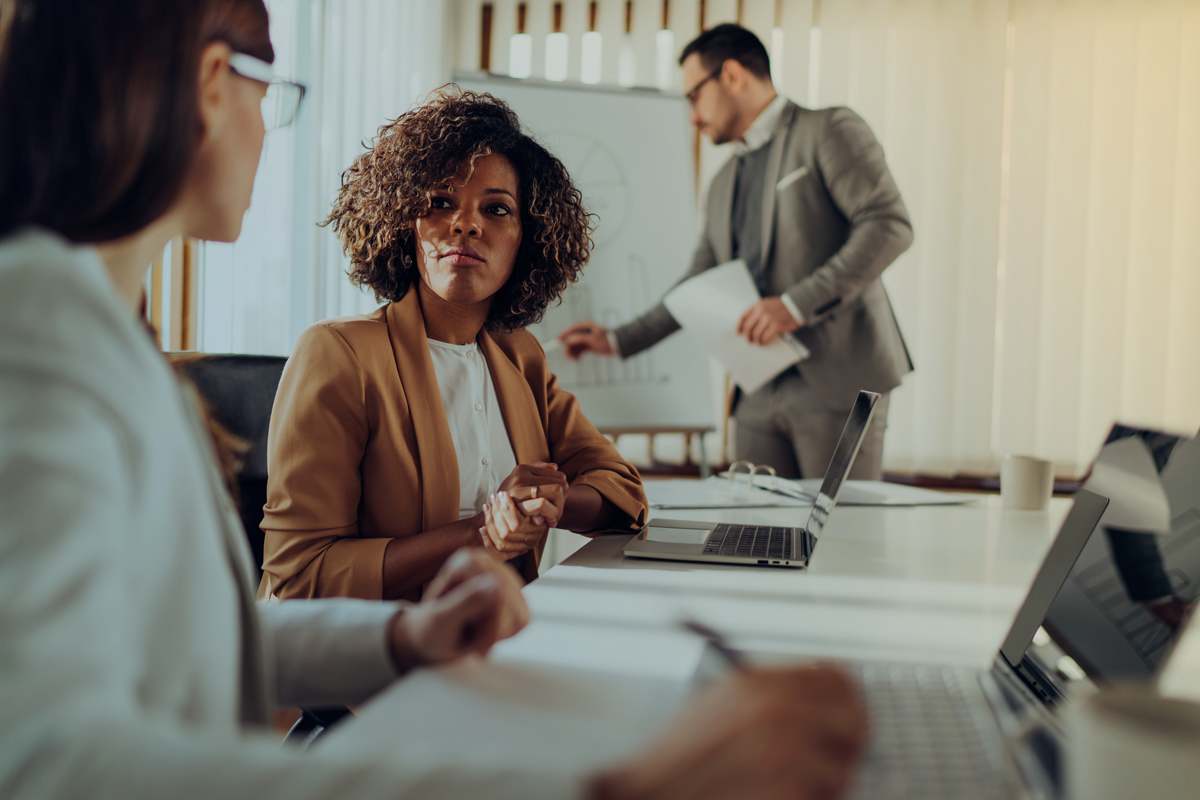 female healthcare business leaders discussing patient billing in june 2023